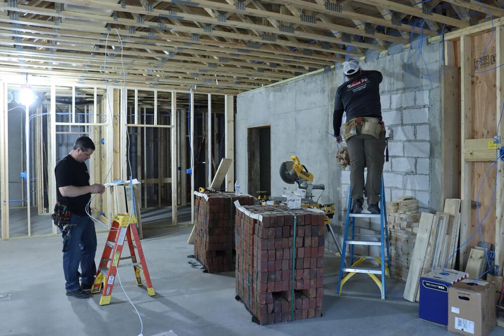 Netwire PC technicians installing structured cabling during new construction