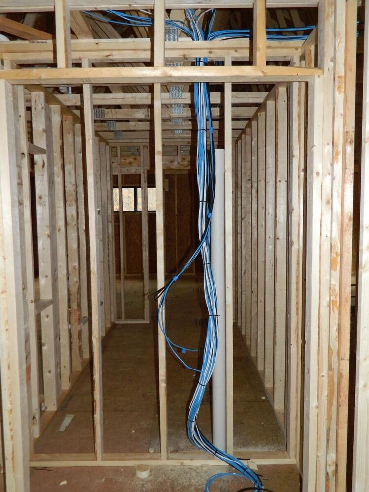 Structured cabling and Cat6 network wiring rough-in during new home framing in Lancaster County PA